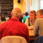 Participants at a death cafe in Designs Gallery, Castle Douglas
