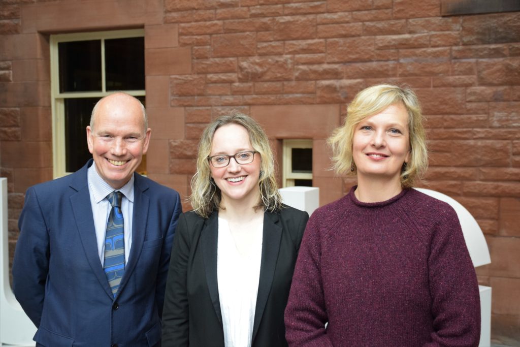 David Clark, Naomi Richards, Marian Krawczyk standing together facing camera